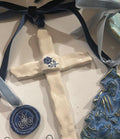 blue and white ceramic cross