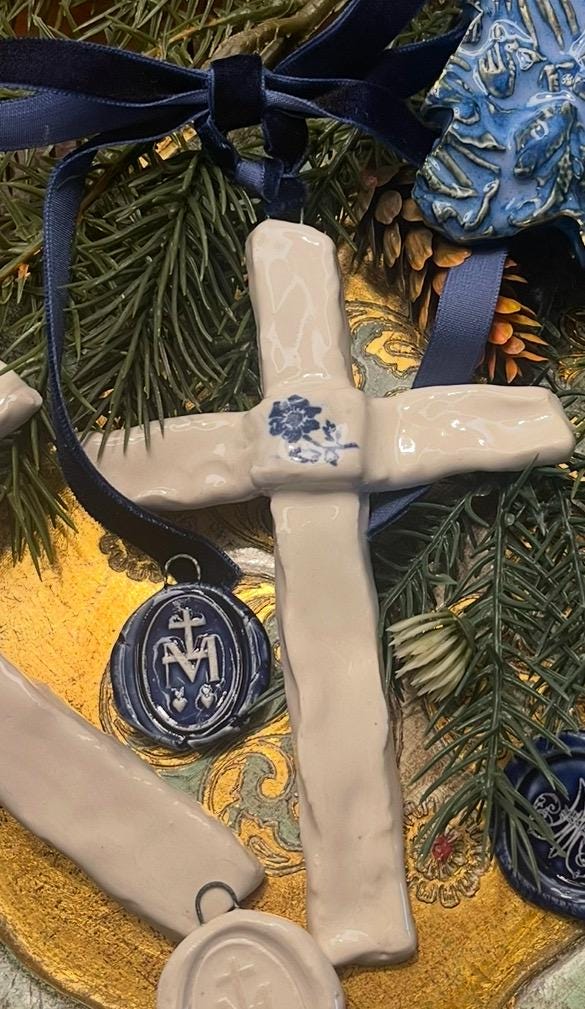 blue and white ceramic cross