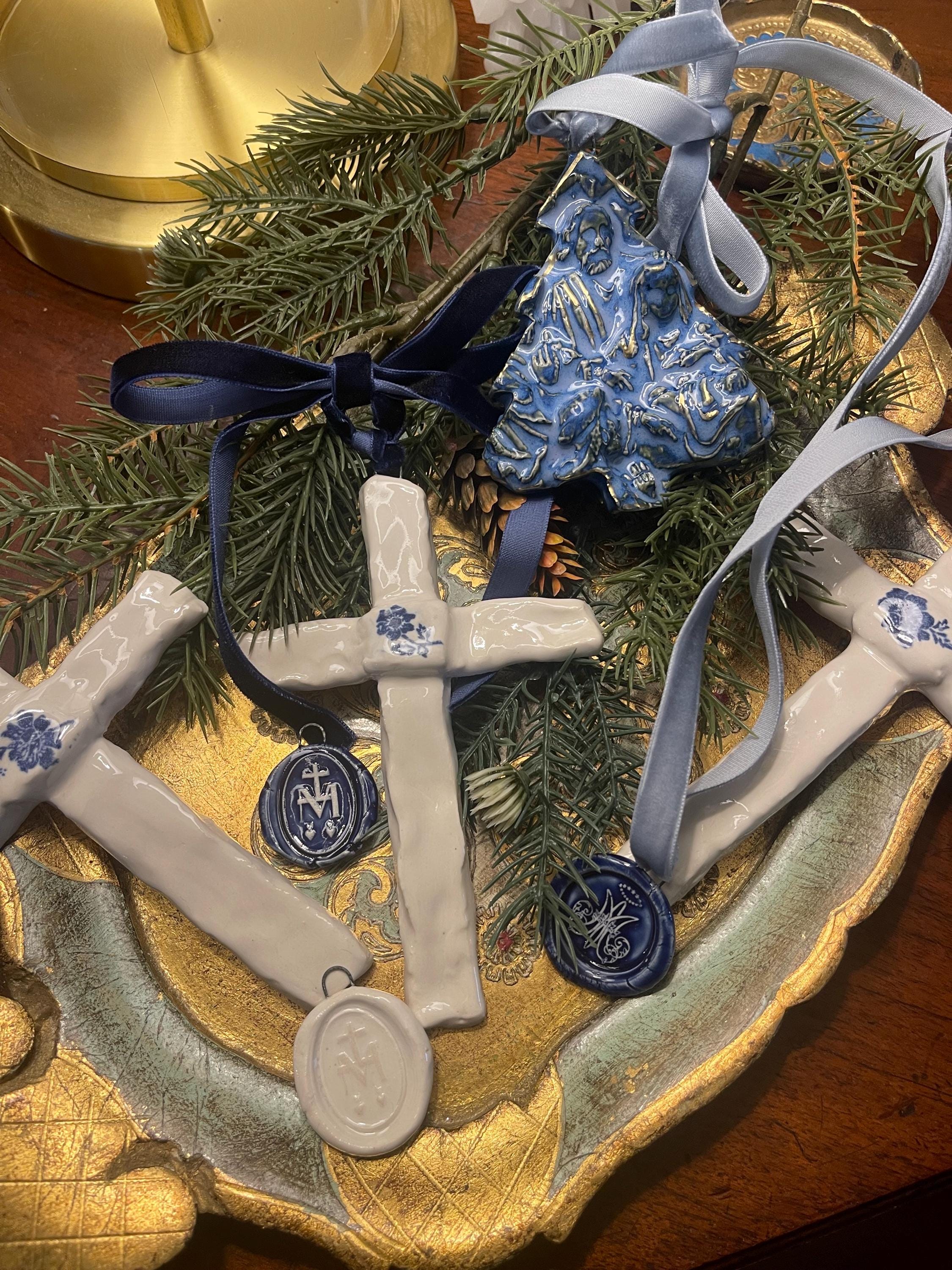 blue and white ceramic cross